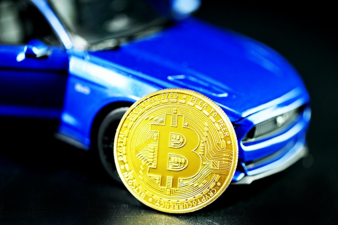 gold round coin on blue car